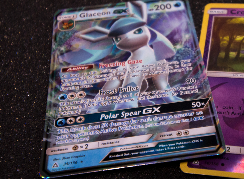 Illustration for article titled Let's Open Some Pokemon Ultra Prism Cards And See If There's Anything Good